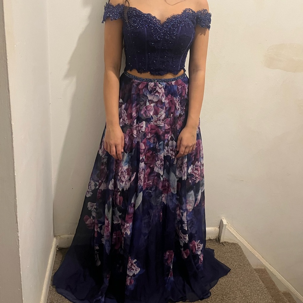 Purple floral maxi dress with beaded top off the shoulder style and zip back.